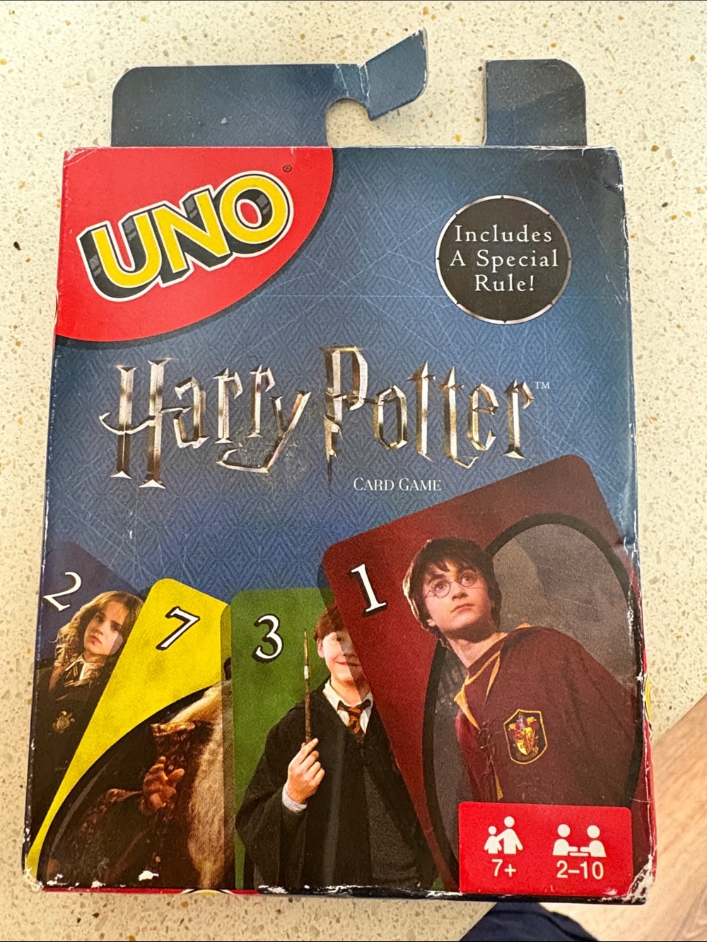 Mattel UNO Harry Potter Card Game Box with Red, Blue, Green, Yellow Accents